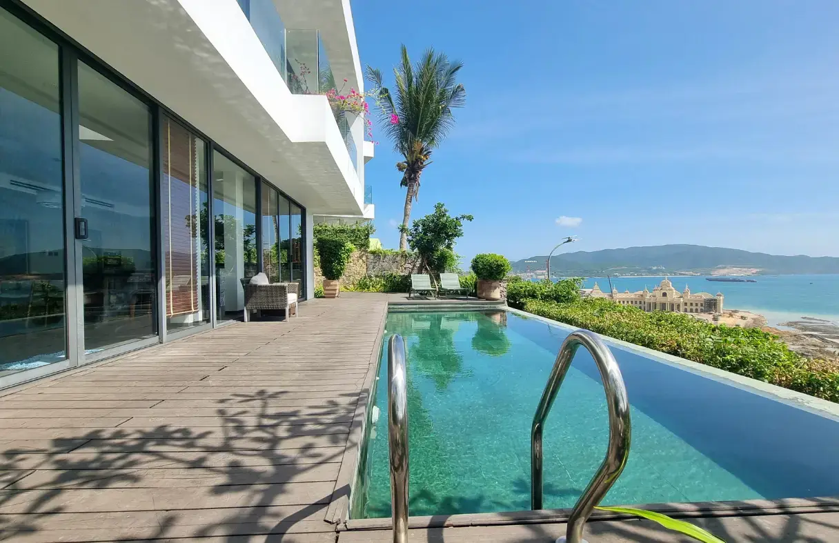 Exclusive beachfront luxury villa in Da Nang with direct access to a private pool.