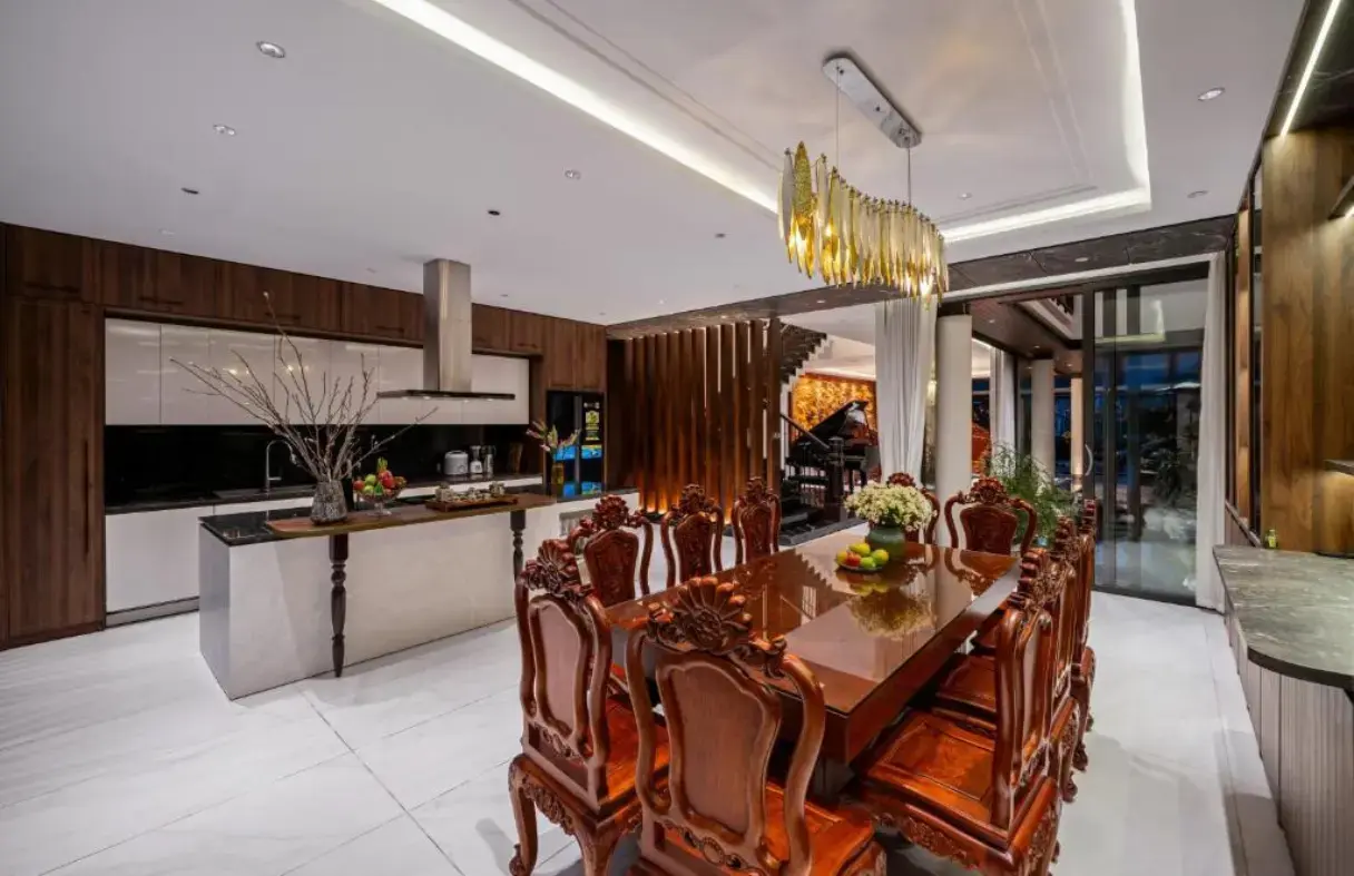 Dining and kitchen area inside a spacious Da Nang river villa