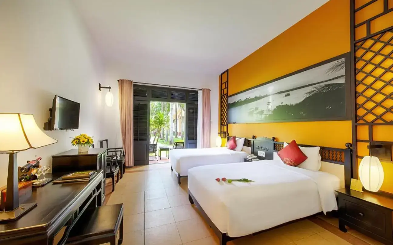 Hoi An Beach Resort Garden View Triple Room
